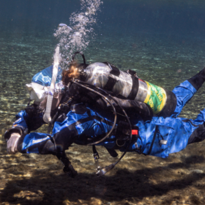Recreational foundations diver showing trim and buoyancy work, hovering just off the bottom of the lake without disturbing the silt.
